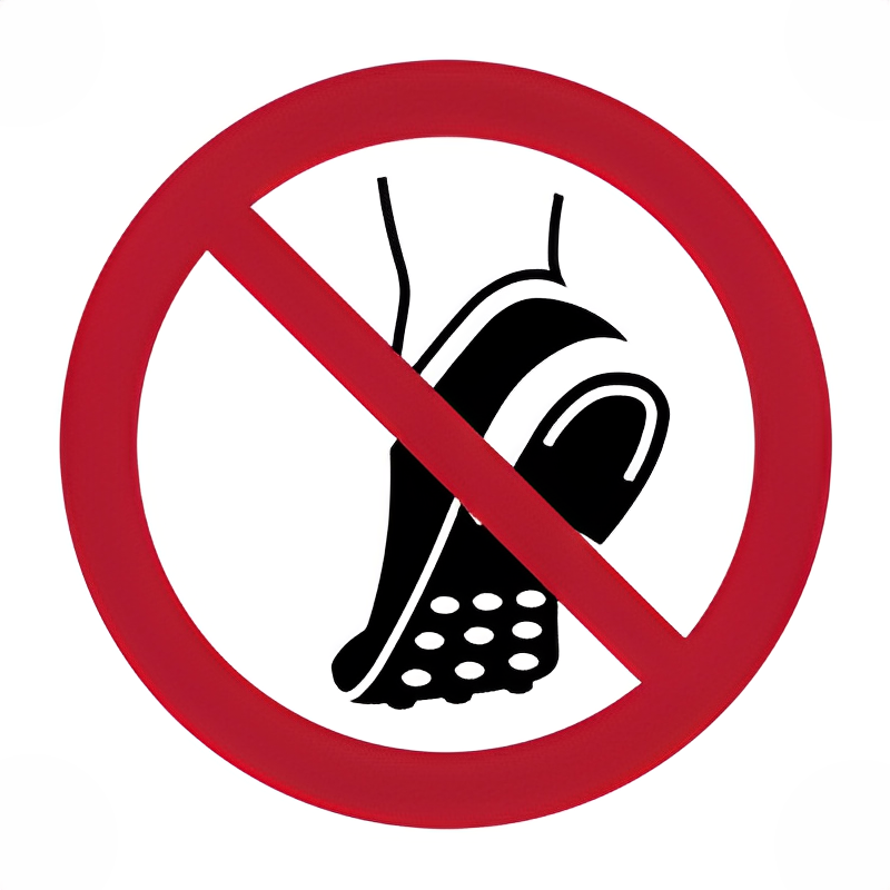 Señal prohibido botas de tacos.